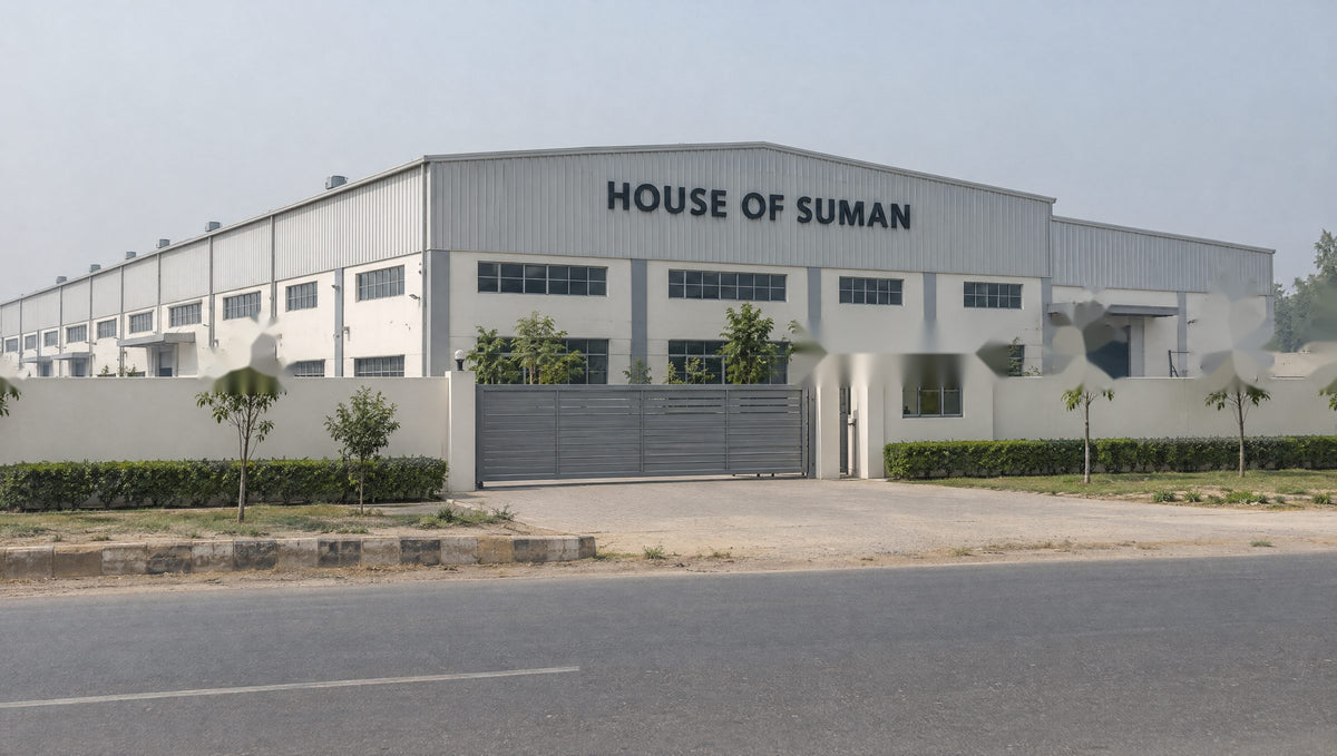 The House of Suman factory in Bahadurgarh, Haryana, with its name on the building above the gate